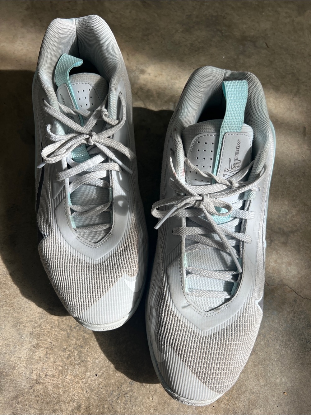 Nike White Sneakers with Light Teal Accents